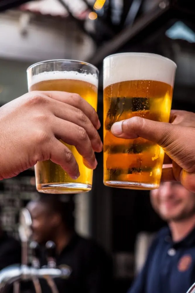 a person drinking from a cup