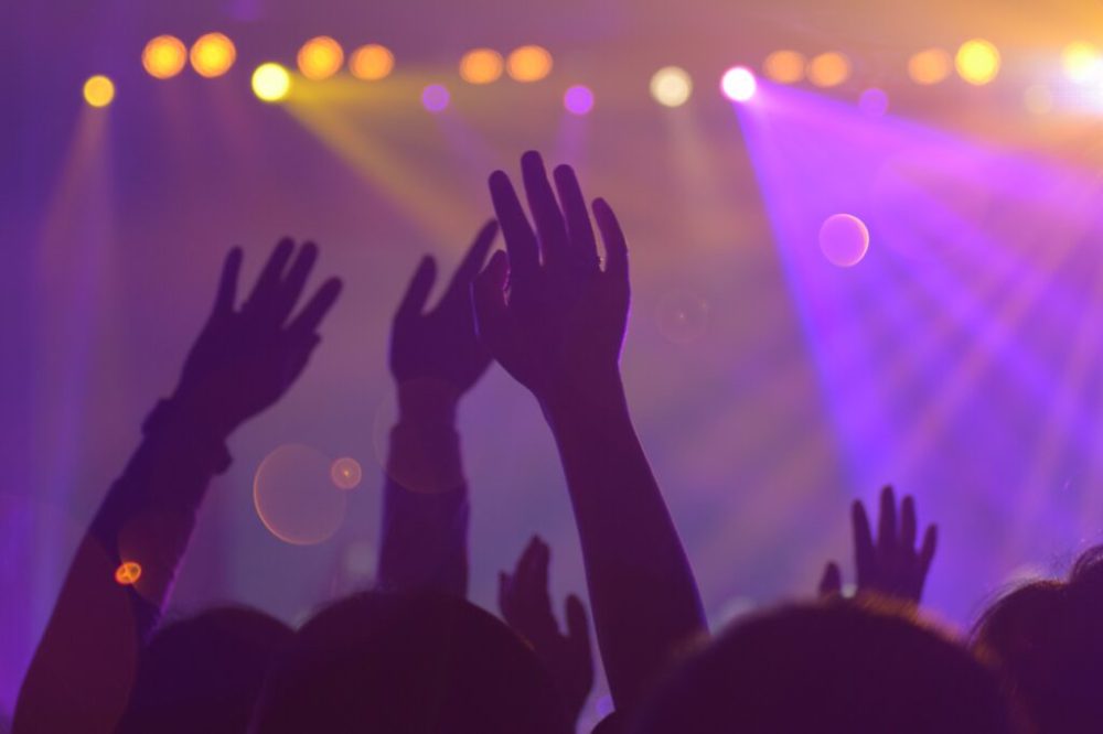 a person standing in front of a stage