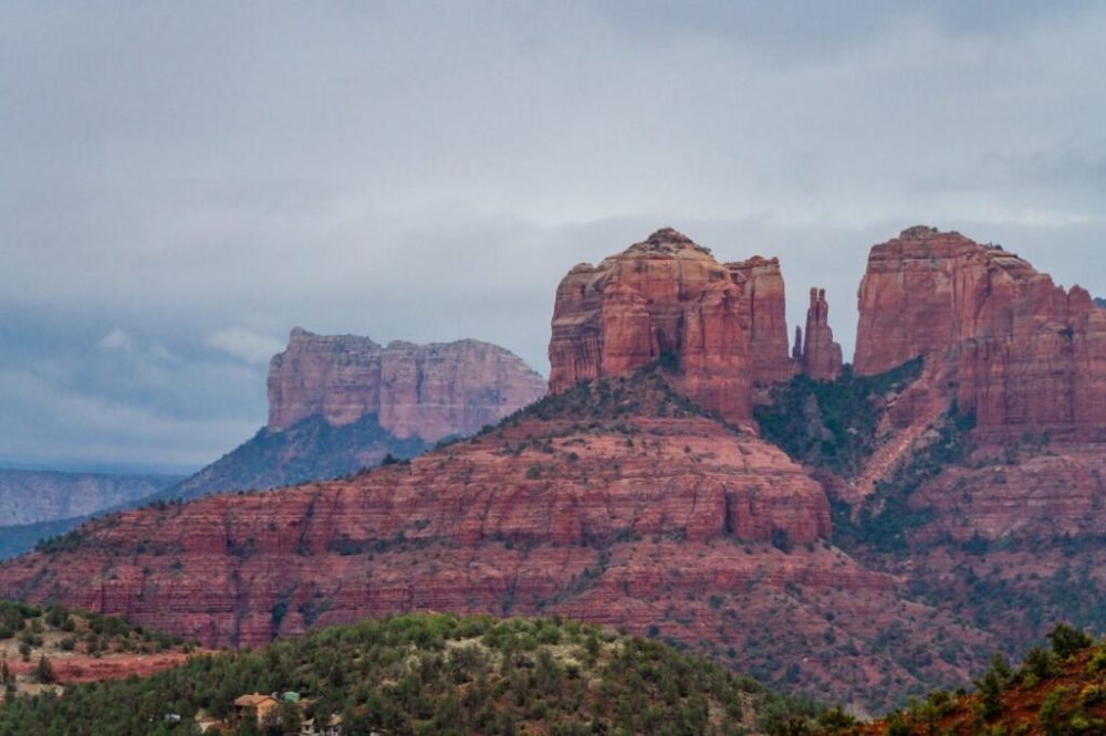 a canyon with Bell Rock in the background