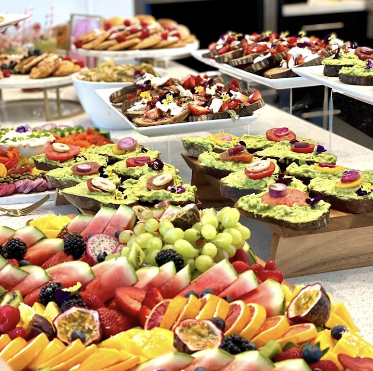 a variety of fruits and vegetables on display in a store