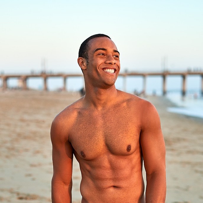 a man standing on a beach