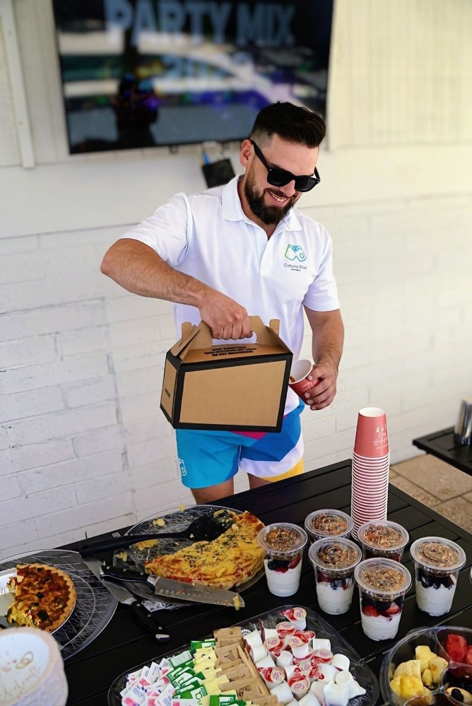 a man cutting food on a table