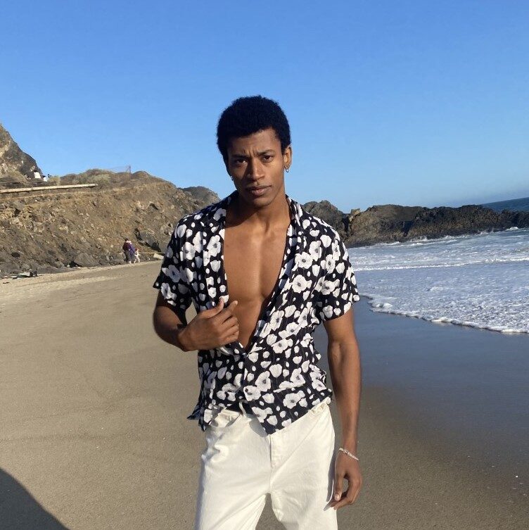 a man standing on a beach